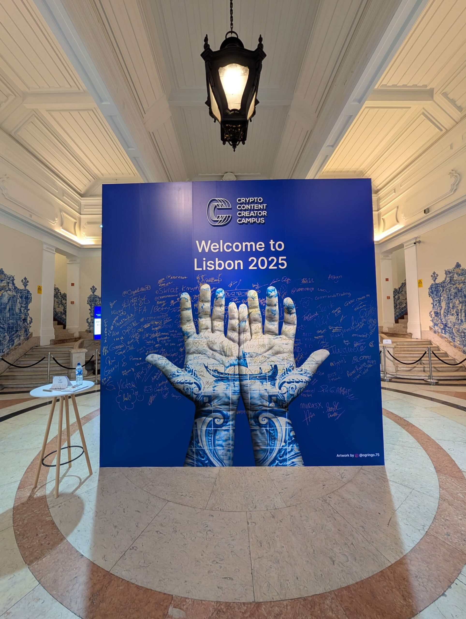 Integrating brand touchpoints: The entry hall signature wall, designed for attendee engagement.